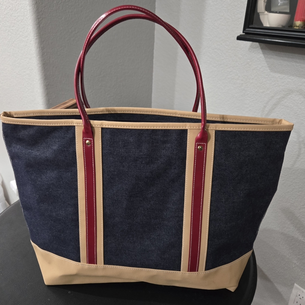 Estee Lauder Stylish Denim and Tan Tote Bag with Red Accents